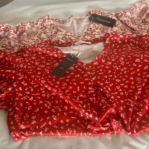 Two Red Floral V Neck Shirts